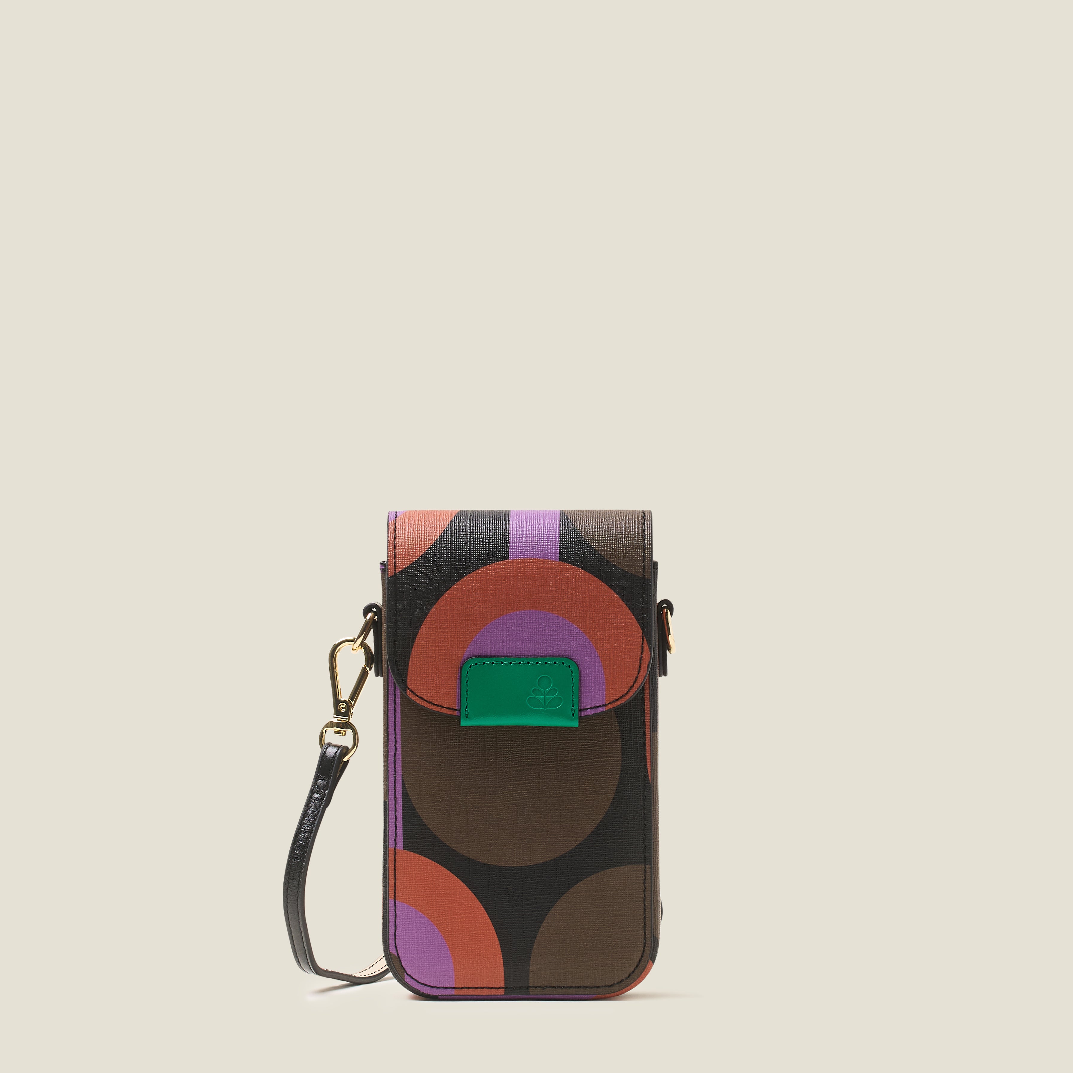 Multicolored purple patterned phone case with a crossbody strap and green leather trim branding on a beige background