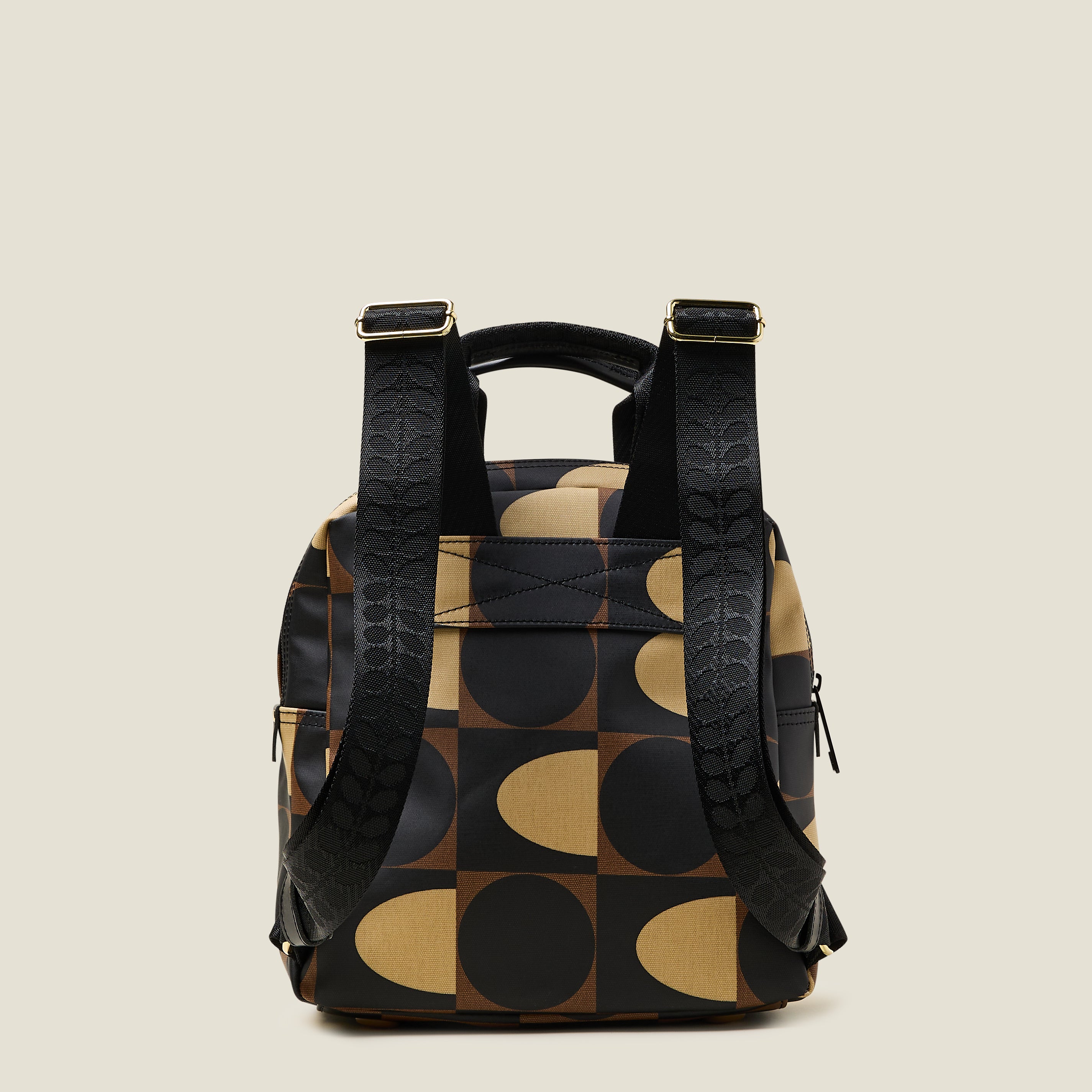 Back view of Mini Lotta Backpack in a brown geometric pattern, featuring branded straps.