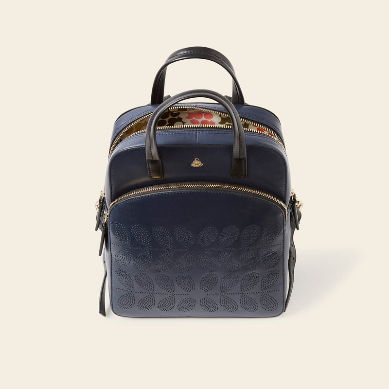 Emilia Backpack in Navy Punched Flower pattern by Orla Kiely