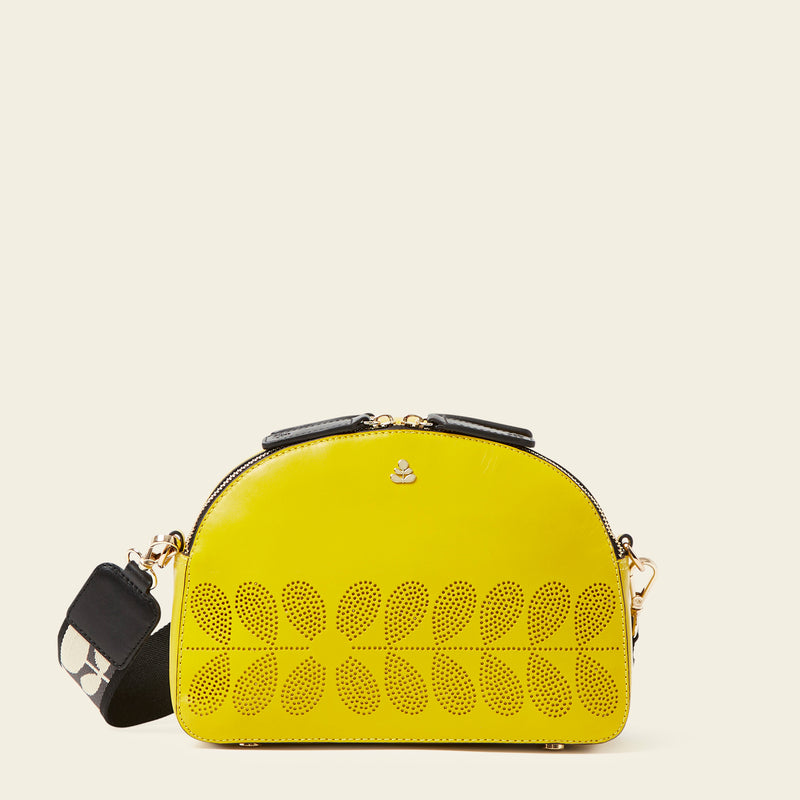 Luna Crossbody Bag in Daffodil Punched Flower by Orla Kiely