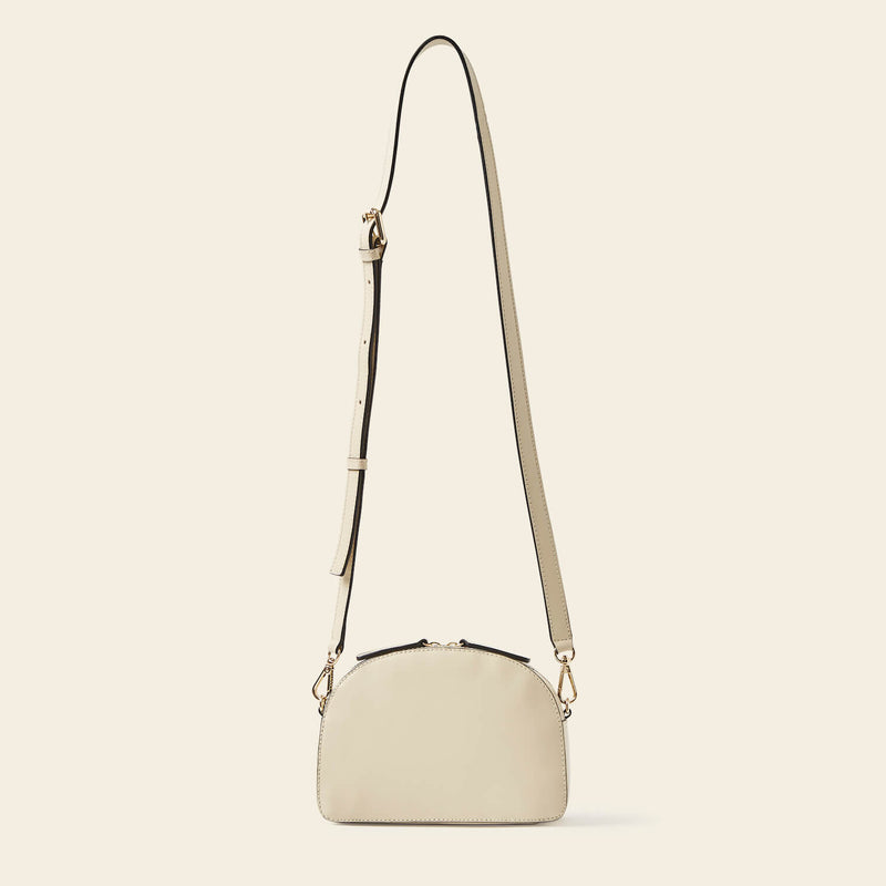 Babaluna Crossbody Bag in Cream Punched Flower pattern by Orla Kiely