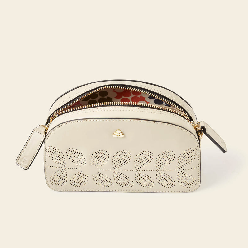 Babaluna Crossbody Bag in Cream Punched Flower pattern by Orla Kiely