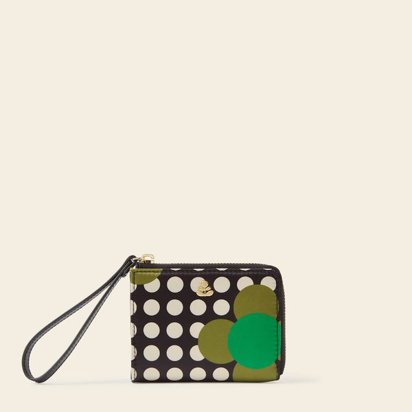 Carla Zip Purse in Jewel Flower Polka Dot pattern by Orla Kiely