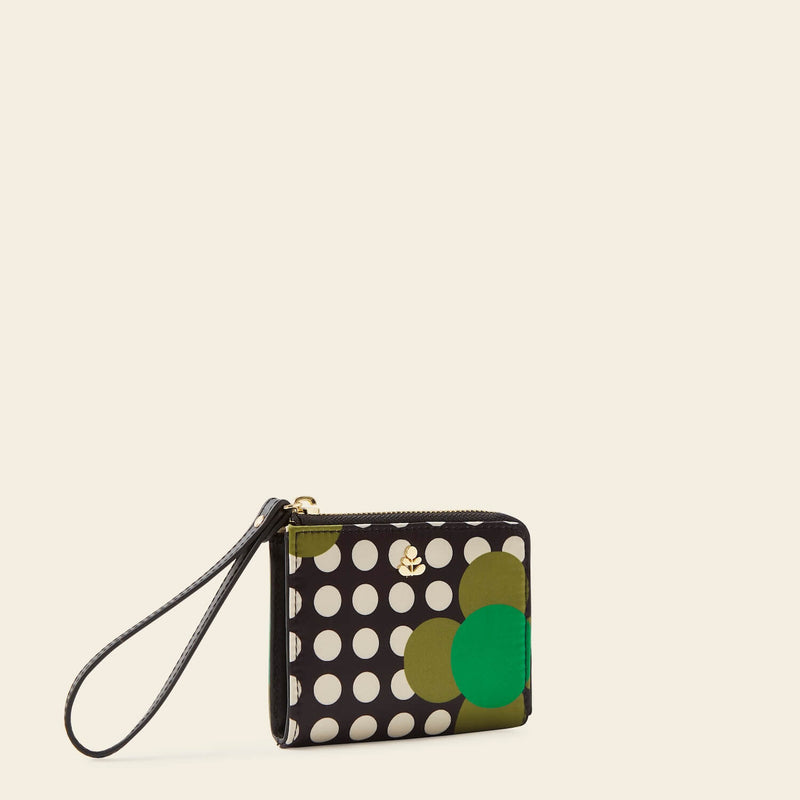 Carla Zip Purse in Jewel Flower Polka Dot pattern by Orla Kiely