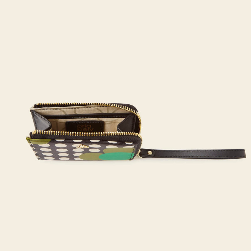 Carla Zip Purse in Jewel Flower Polka Dot pattern by Orla Kiely