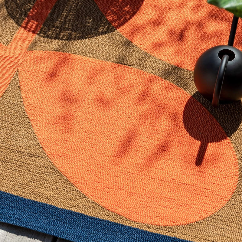 Close up of Giant Sixties Stem tomato orange Rug by Orla Kiely