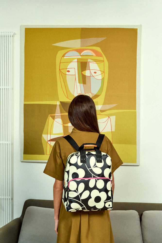 Looking at a piece of art with an Orla Kiely spring bloom backpack