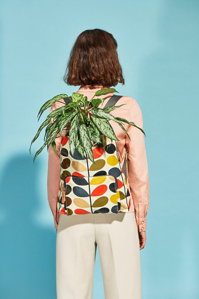 Plant growing of a classic Orla Kiely multi stem backpack