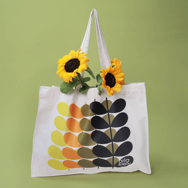 Orla Kiely Canvas Tote Bag holding sunflowers